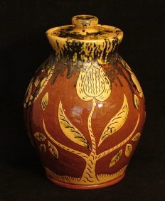 redware jar, sgraffito flowers, front