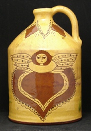 redware gallon jug, angel with wings