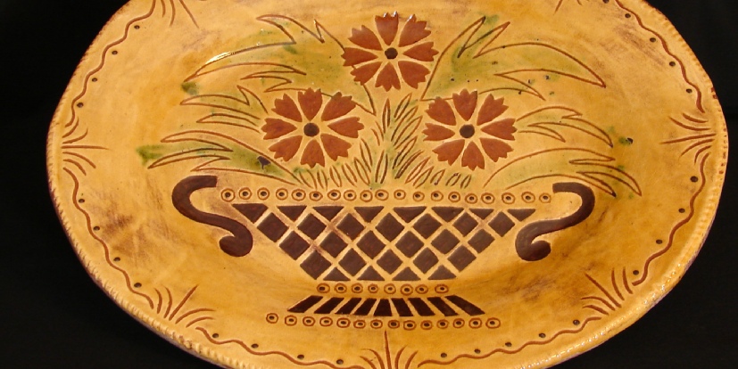 redware oval platter flower basket