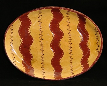 redware oval platter, waves