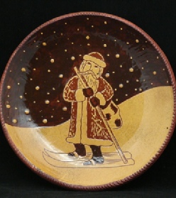 Santa on Skis redware plate, Kulina Folk Art