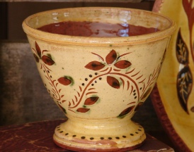 redware fruit bowl, tulips and flowers, side