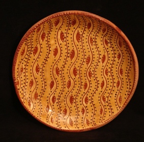 redware plate, leaves and waves